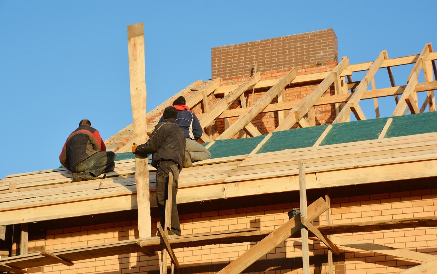 bigstock-Roofing-Contractors-Installing