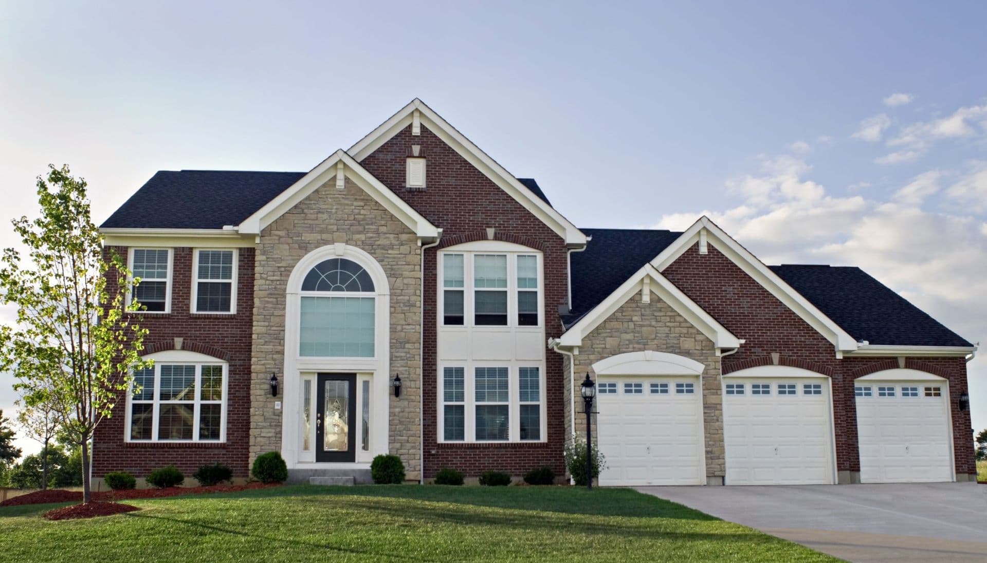 bigstock-Three-Car-Garage-Luxury-Home